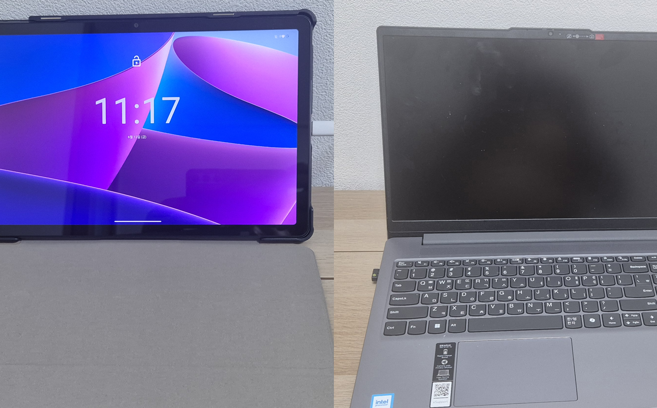 A budget Android tablet next to a laptop — same storage, a fraction of the price